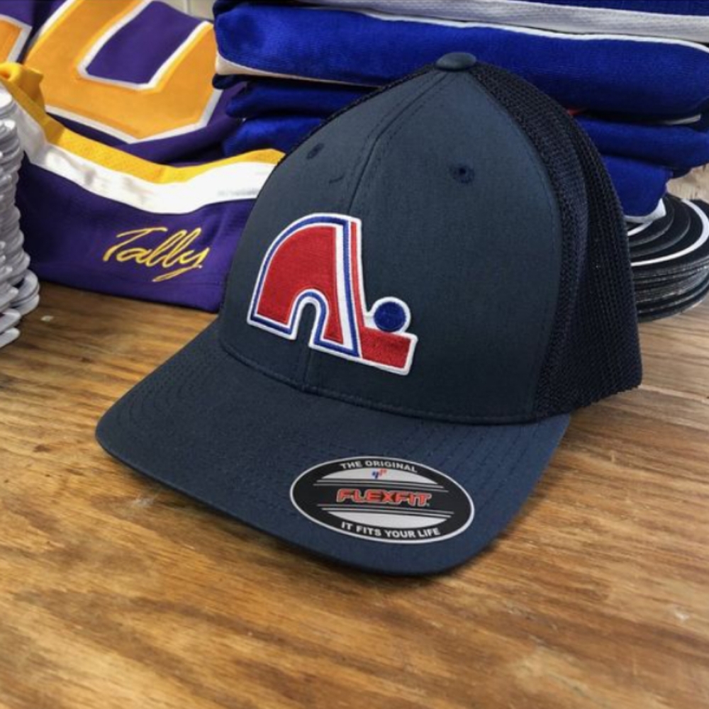 Flex-fit Hat With a Nordiques crest / logo.